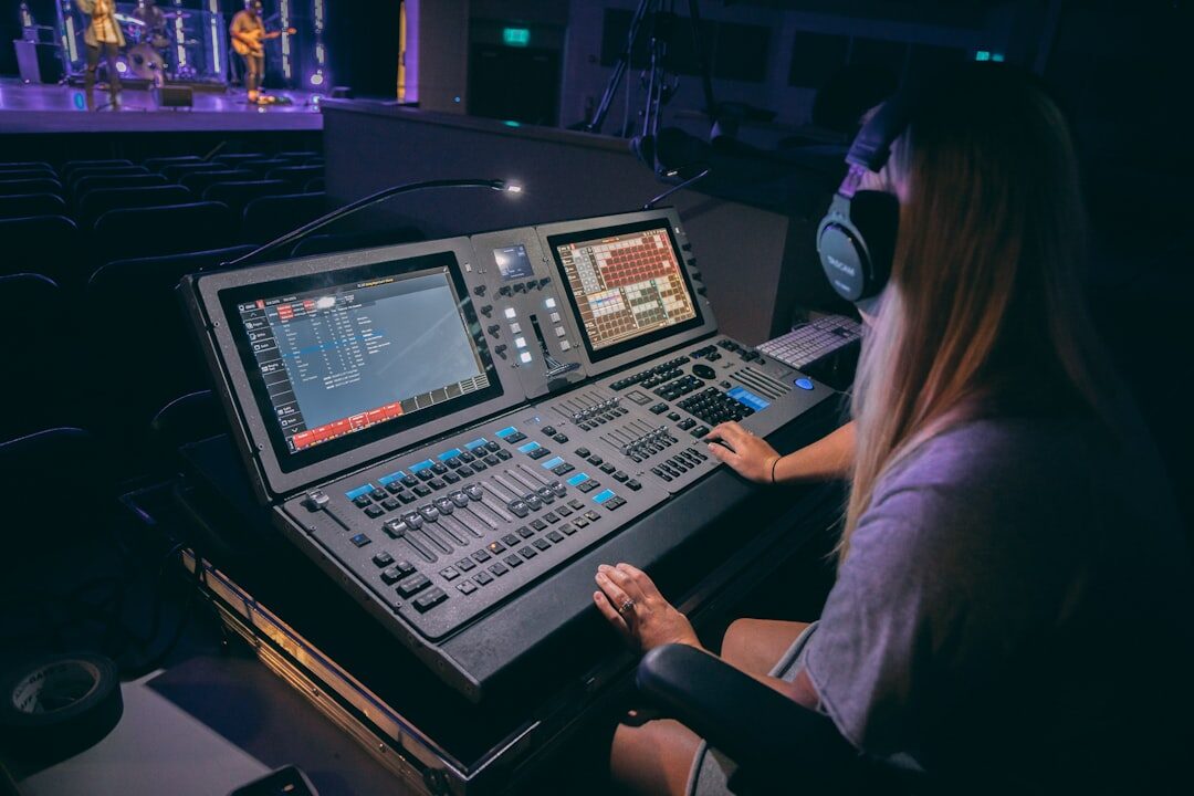 Professional live broadcast production studio with multiple screens and equipment