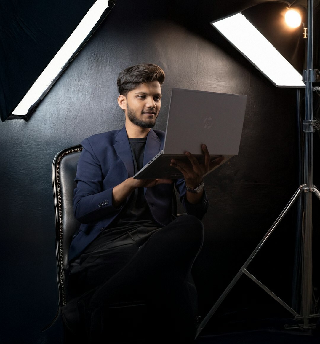 Rafael Santos, Director of Production, professional Brazilian man in business attire